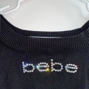Bebe cropped black sweater in size S